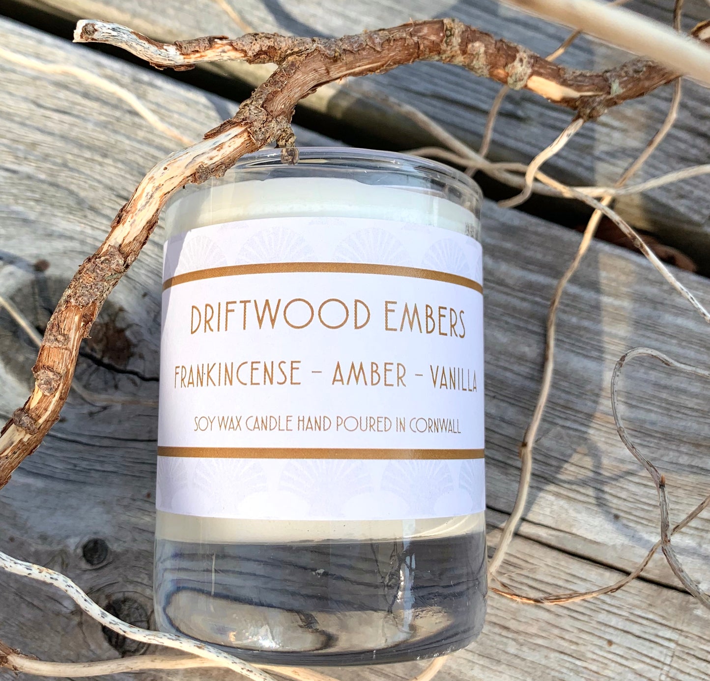 Driftwood Embers Candle Frankincense - Amber - Vanilla £20 Citrus top notes lead to a heart of musky spices resting on a warm vanilla base Ingredients: natural plant wax, fragrance oils Shell may vary to image shown Double wicked plant wax candle . Burns for approx 40 hours. Made in Cornwall by Seawitch Candles " Cosy and comforting with a hint of smokiness. We have bought 6 and counting! Our favourite candle ever." - Joe and Deb