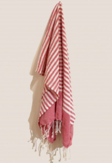 Striped Hammam Towel – pink £14.00  This 100% cotton Hammam towel is both  light-weight and durable. Perfect for the beach or traveling.  Highly absorbent; quick drying and super versatile, it makes the perfect bath towel, sarong or table cloth.  100 % cotton  100 x 180 cm  Ethically made in India shop small. shop fair trade, shop Cornwall, shop local, shop independent, Seawitch store, Mousehole , Cornwall, beach towel, yoga,