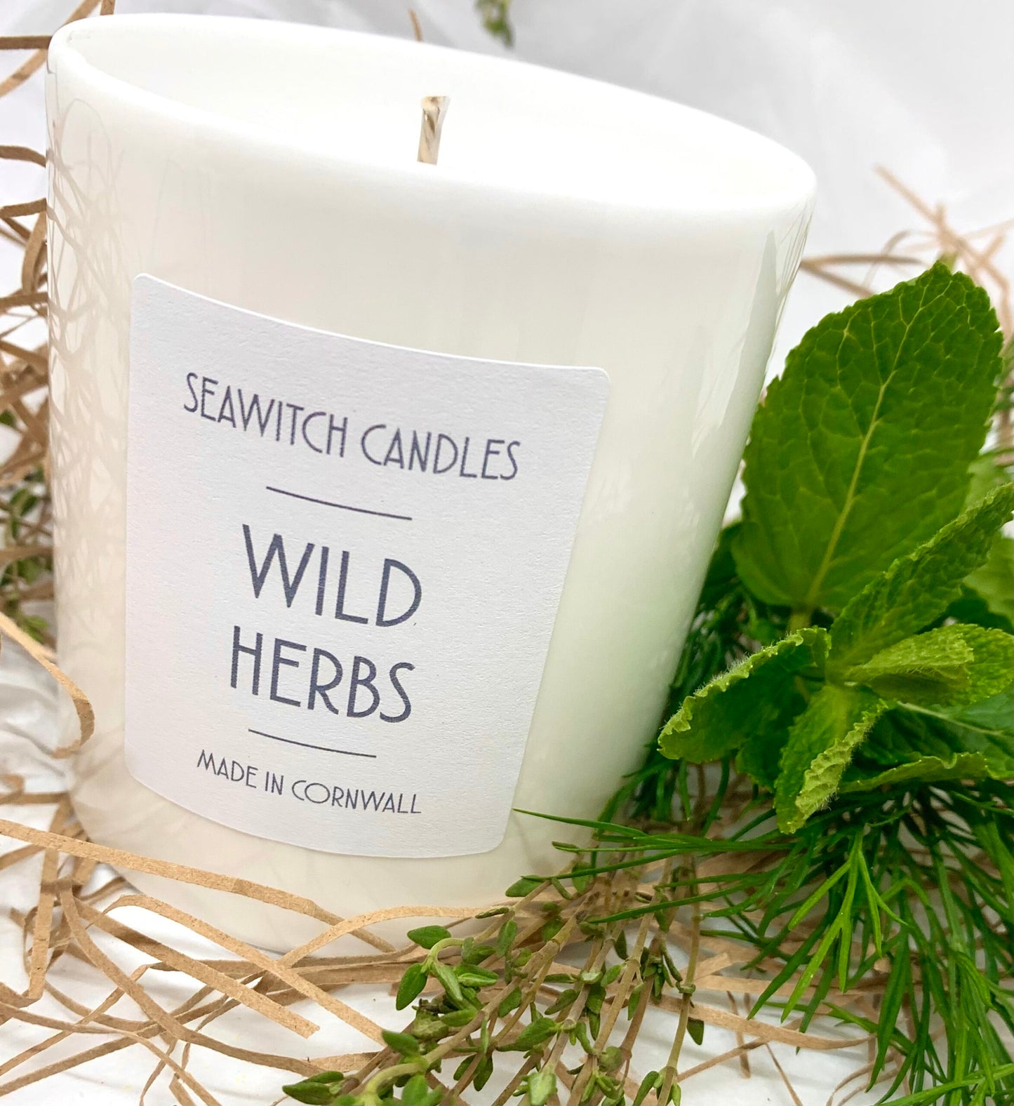 A vibrant, refreshing blend of wild Mediterranean herbs Burn time of at least 50 hours Ingredients: natural vegan plant wax, fragrance oils, cotton wick This candle is hand poured into a white china pot and is made in Mousehole, Cornwall by Seawitch Candles