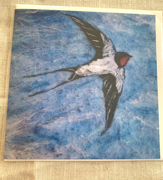April Swallow - Zennor  £3.50  Card from an original felting by Cornish artist, Rowena&nbsp;  This is a card of an original felting inspired by the first swallow sighted this year in April with my son&nbsp;We were walking in Zennor, Cornwall. It is also inspired by the poem by Sara Teasdale ‘There will come soft rains’ – see below. A line from the poem is printed on the back of the card. 