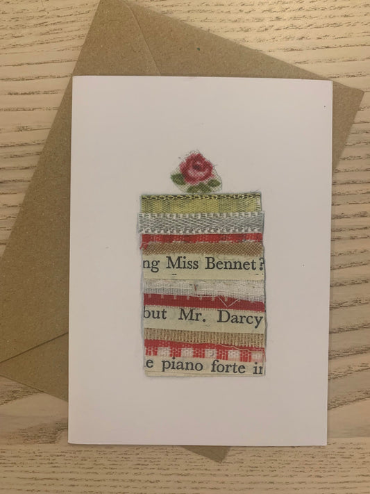 Card - pride & prejudice cake - jane austen themed Pride &amp; Prejudice cake Card from an original fabric collage by Danielle mason-Pike  £2.50  Greetings Card with Brown Kraft Envelope  Blank inside for your own message  Exclusive to Seawitch Stores  Designed &amp; Printed in Cornwall