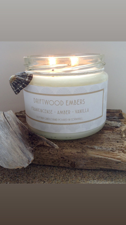Driftwood Embers Candle  Frankincense - Amber - Vanilla  &nbsp;£20  Citrus top notes lead to a heart of musky spices resting on a warm vanilla base  Ingredients: natural plant wax, fragrance oils  Shell may vary to image shown  &nbsp;Double wicked plant wax candle . Burns for approx 40 hours. Made in Cornwall by Seawitch Candles  " Cosy and comforting with a hint of smokiness. We have bought 6 and counting! Our favourite candle ever." - Joe and Deb