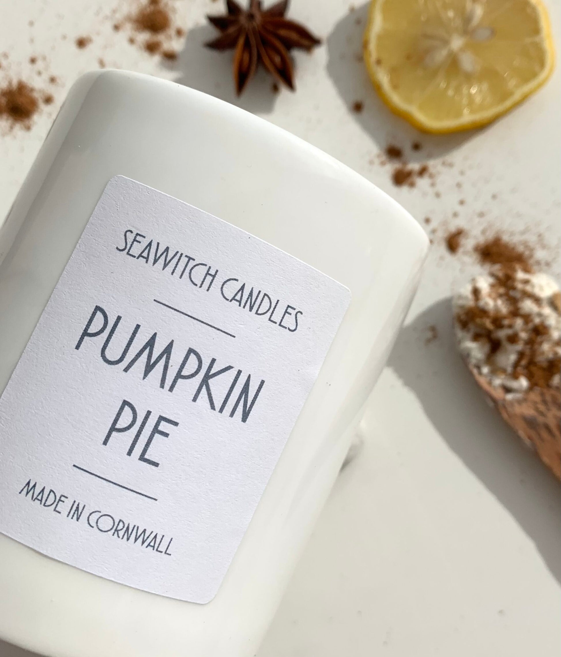 Pumpkin Pie Scented Candle&nbsp;  £20  Caramelised citrus blended with nutmeg, ginger and &nbsp;clove wrapped in a blanket of vanilla  &nbsp;Burn time of at least 50 hours  Ingredients: natural vegan plant wax, fragrance oils, cotton wick  This candle is hand poured into a white china pot and is made in Mousehole, Cornwall by Seawitch Candles Halloween, Samhain, Pumpkins.